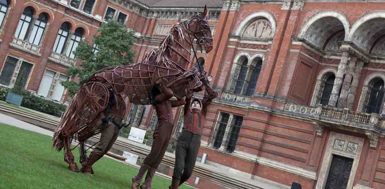 War Horse puppet Joey in the V&A John Madejski Garden with Nicholas Hart (head), Stuart Angell (heart), Thomas Goodridge (hind). Photo: Victoria and Albert Museum, London