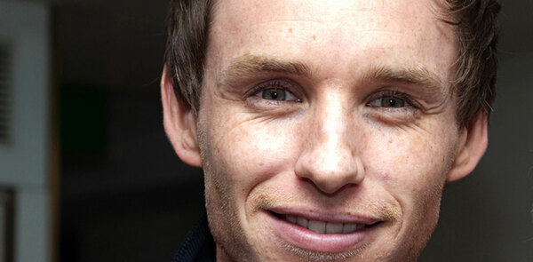 Eddie Redmayne and Joanne Froggatt fly the British flag at the Golden Globes