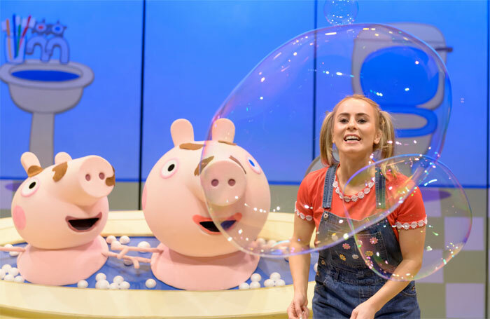 Emma Grace Arends with puppets in Peppa Pig's Surprise! Photo: Dan Tsantilis