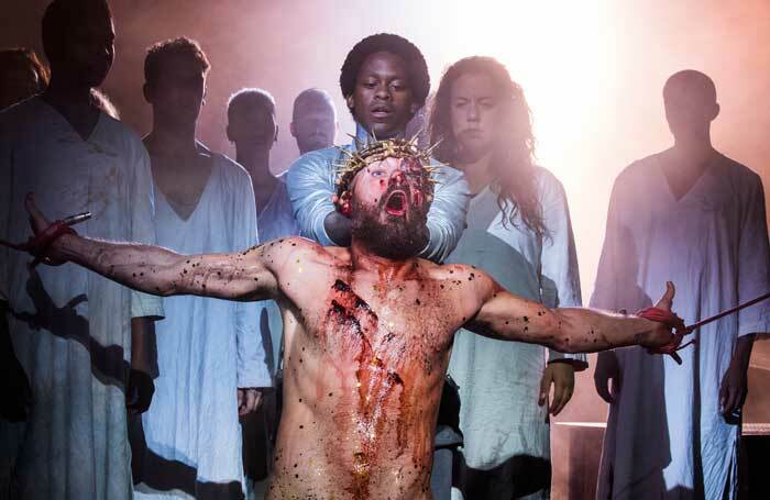 Declan Bennet (front) and Tyrone Huntley (back, centre) in Jesus Christ Superstar. Photo: Tristram Kenton