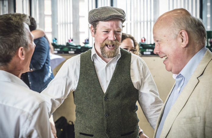 Rufus Hound (centre) with composer George Stiles and book writer Julian Fellowes at a rehearsal for The Wind in the Willows, a new musical that has raised &pound;1 million through online crowdfunding. Photo: Marc Brenner