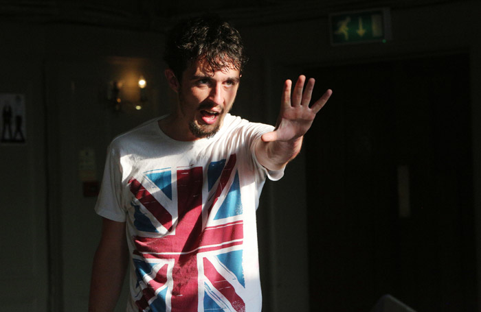 SidAbovetheArtsTheatreRoyTan5j