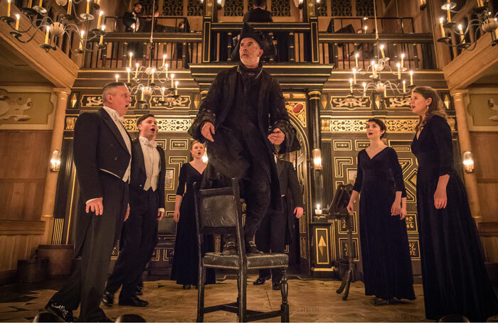 Sean Campion and members of Genesis Sixteen in All the Angels: Handel and the First Messiah at Sam  Wanamaker Playhouse. Photo: Marc Brenner