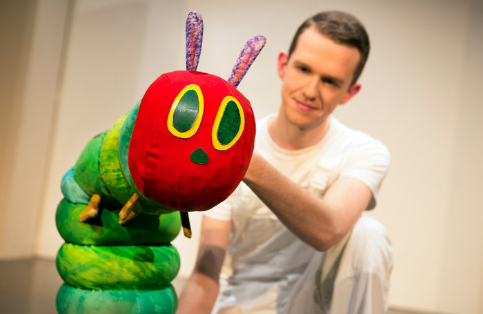 Adam Ryan in The Very Hungry Caterpillar Show at Ambassadors Theatre, London. Photo: Pamela Raith Adam Ryan in The Very Hungry Caterpillar Show at Ambassadors Theatre, London. Photo: Pamela Raith