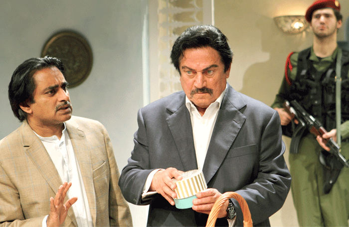 Sanjeev Bhaskar, Steven Berkoff and Zed Josef in Dinner with Saddam at the Menier Chocolate Factory, London. Photo: Catherine Ashmore