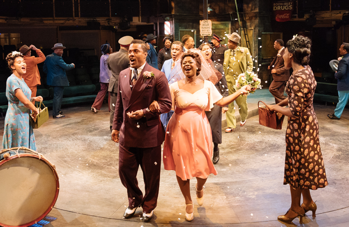 Ray Fearon Lucy Vandi  (centre) in Guys and Dolls at the Royal Exchange, Manchester. Photo: Manuel Harlan