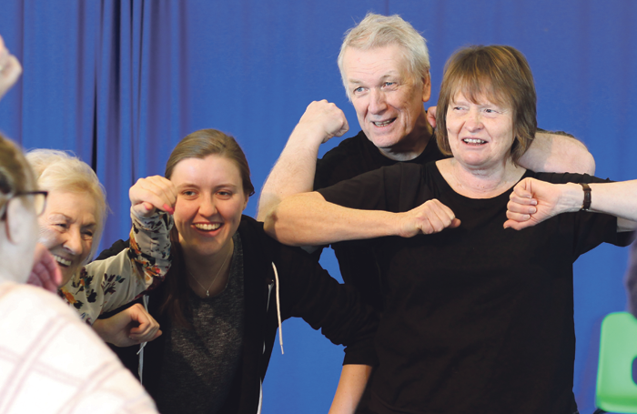 Manchester Royal Exchange Theatre’s Elders Company rehearsing Moments That Changed Our World. Above, left to right: performers Brenda Hickey, Glyn Treharpne and Jacquie Long with assistant producer Brogan Campbell (second left). Manchester Royal Exchange Theatre’s Elders Company rehearsing Moments That Changed Our World. Above, left to right: performers Brenda Hickey, Glyn Treharpne and Jacquie Long with assistant producer Brogan Campbell (second left).