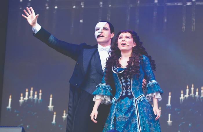 Ben Lewis as The Phantom alongside Kelly Mathieson as Christine in The Phantom of The Opera