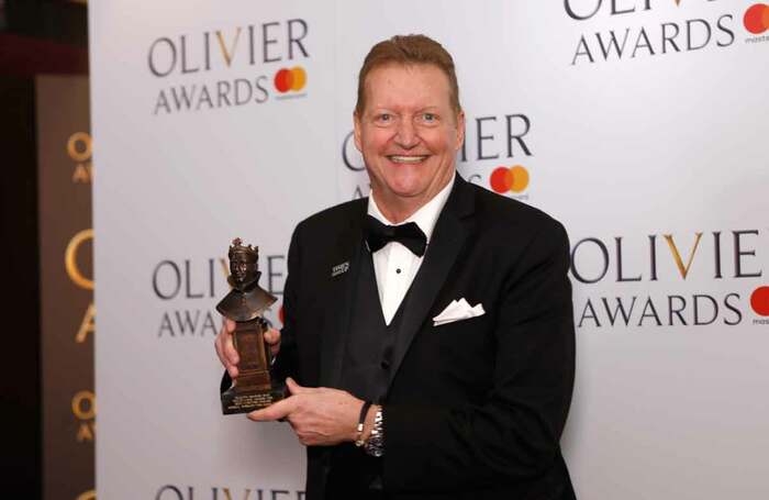 Howell Binkley with his award at the 2018 Oliviers. Photo: Pamela Raith