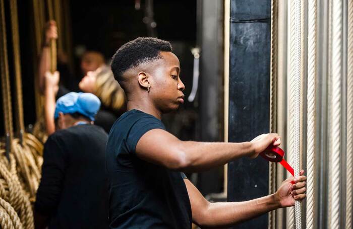 A young theatre technician backstage. Photo: Alex Brenner/Tiata Fahodzi