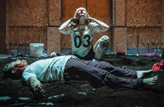 Can the stage have more mud? Sophie Russell and Jonathan Broadbent in Henry VI at the Sam Wanamaker Playhouse, with design by Grace Smart. Photo: Marc Brenner