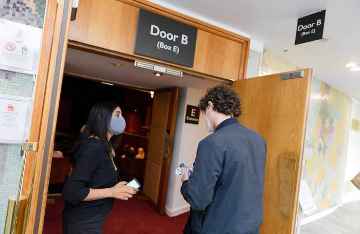 Front-of-house staff and audience member at Coventry's Belgrade Theatre on May 17. Photo: Joe Bailey