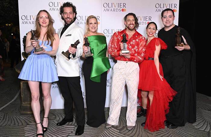 Natasha Hodgson, Felix Hagan, Zoe Roberts, David Cumming, Claire-Marie Hall and Jak Malone, accepting the best new musical award for Operation Mincemeat. Photo: Joanne Davidson