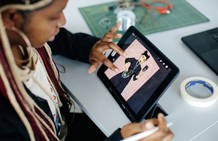 Alexis Obue working on her tablet at University of the Arts London Creative Computing Institute. Photo: Alys Tomlinson