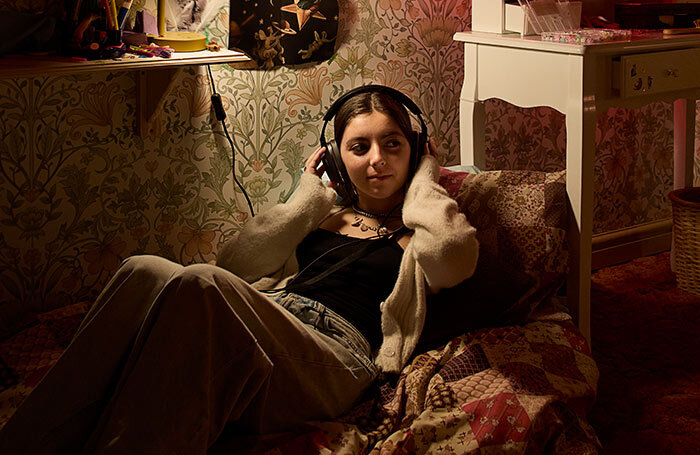 An audience member in a scene from Viola's Room at One Cartridge Place, London. Photo: Julian Abrams