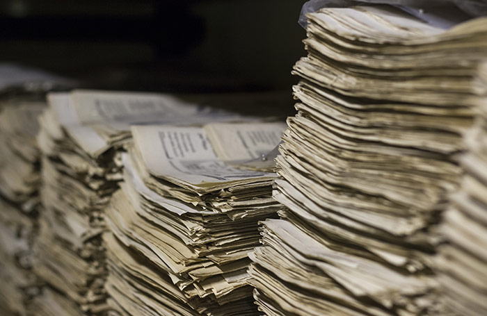 Before the internet, errors were preserved in print for years to come. Shutterstock