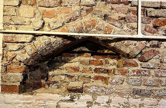 Top of the 15th-century door archway uncovered at St George's Guildhall in King's Lynn where Shakespeare is believed to have performed on stage