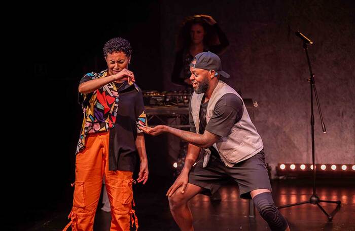 Raphaella Julien and Chris Fonseca in Follow the Signs at Tobacco Factory Theatres, Bristol. Photo: Charlie Swinbourne Raphaella Julien and Chris Fonseca in Follow the Signs at Tobacco Factory Theatres, Bristol. Photo: Charlie Swinbourne