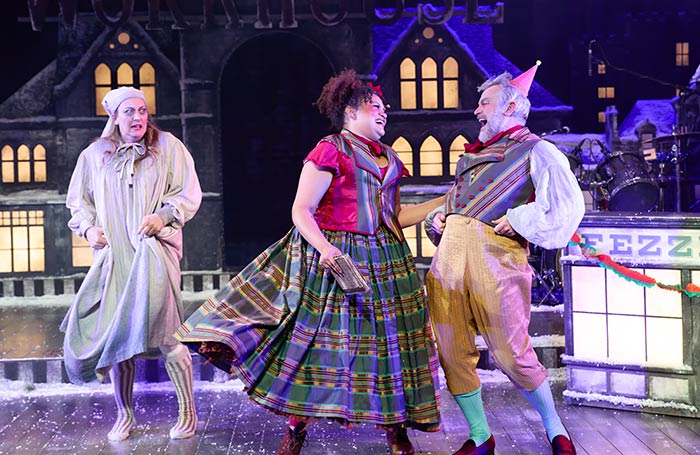 Hannah McPake, Emily Ivana Hawkins and Keiron Self in A Christmas Carol at the Sherman Theatre, Cardiff. Photo: Mark Douet