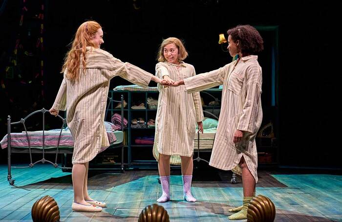 Daisy Sequerra, Yanexi Enriquez and Grace Saif in Ballet Shoes at the National Theatre, London. Photo: Manuel Harlan