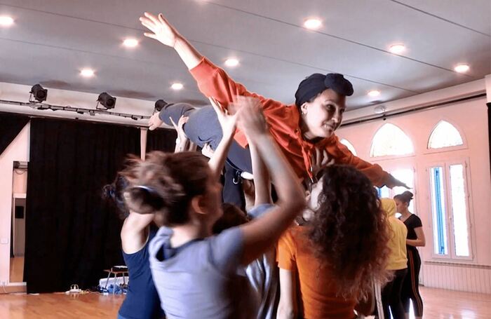 Fida Al Waer in rehearsal, in a still from Tilka