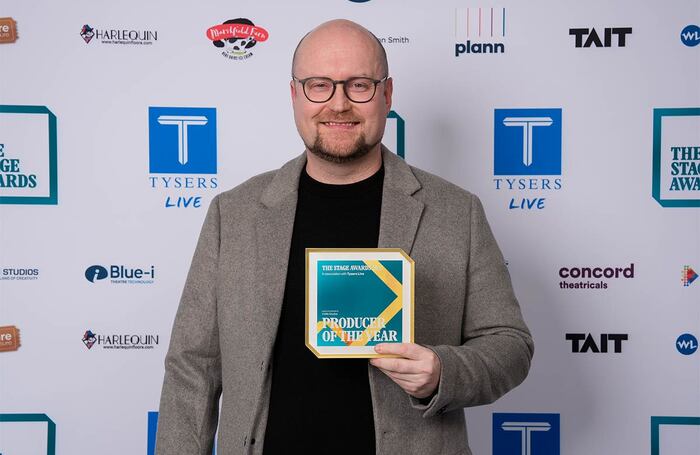 Michael Harrison picks up his award at The Stage Awards 2025. Photo: Alex Brenner