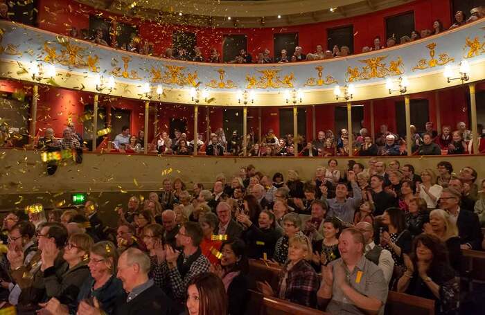 An audience enjoying a show at Theatre Royal Bury St Edmunds