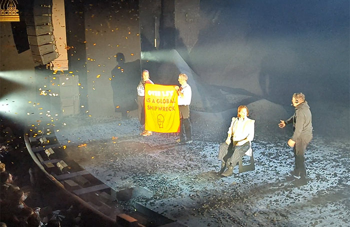 Just Stop Oil protestors interrupting a performance of The Tempest at Theatre Royal Drury Lane. Photo by Just Stop Oil