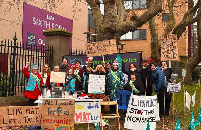 NEU members picketing with Kim Johnson MP (middle) in front of LIPA MAT’s Sixth Form College before Christmas. Photo: NEU