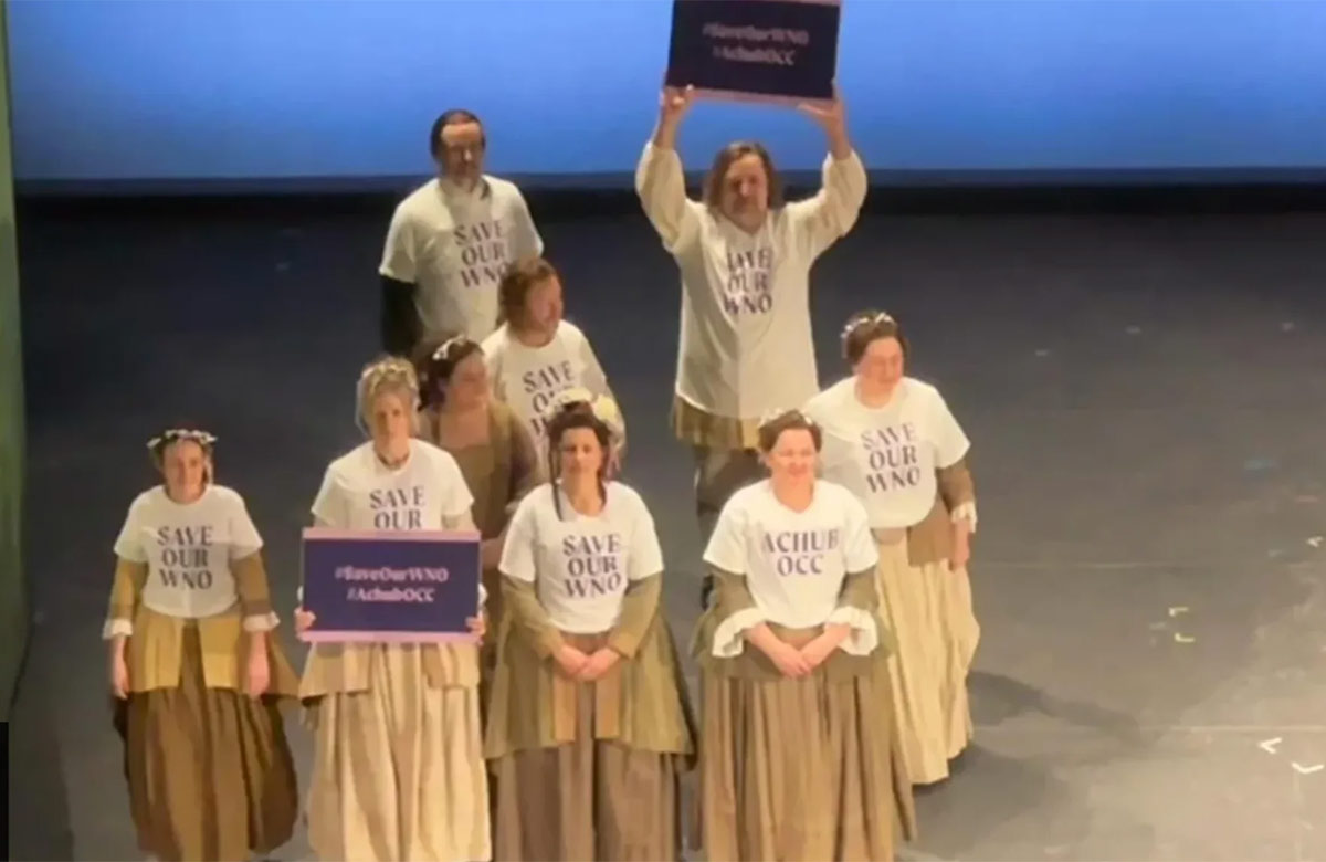Welsh National Opera chorus members in campaign T-shirts on the Wales Milennium Centre stage on February 8, 2025. Photo: Equity Welsh National Opera chorus members in campaign T-shirts on the Wales Milennium Centre stage on February 8, 2025. Photo: Equity