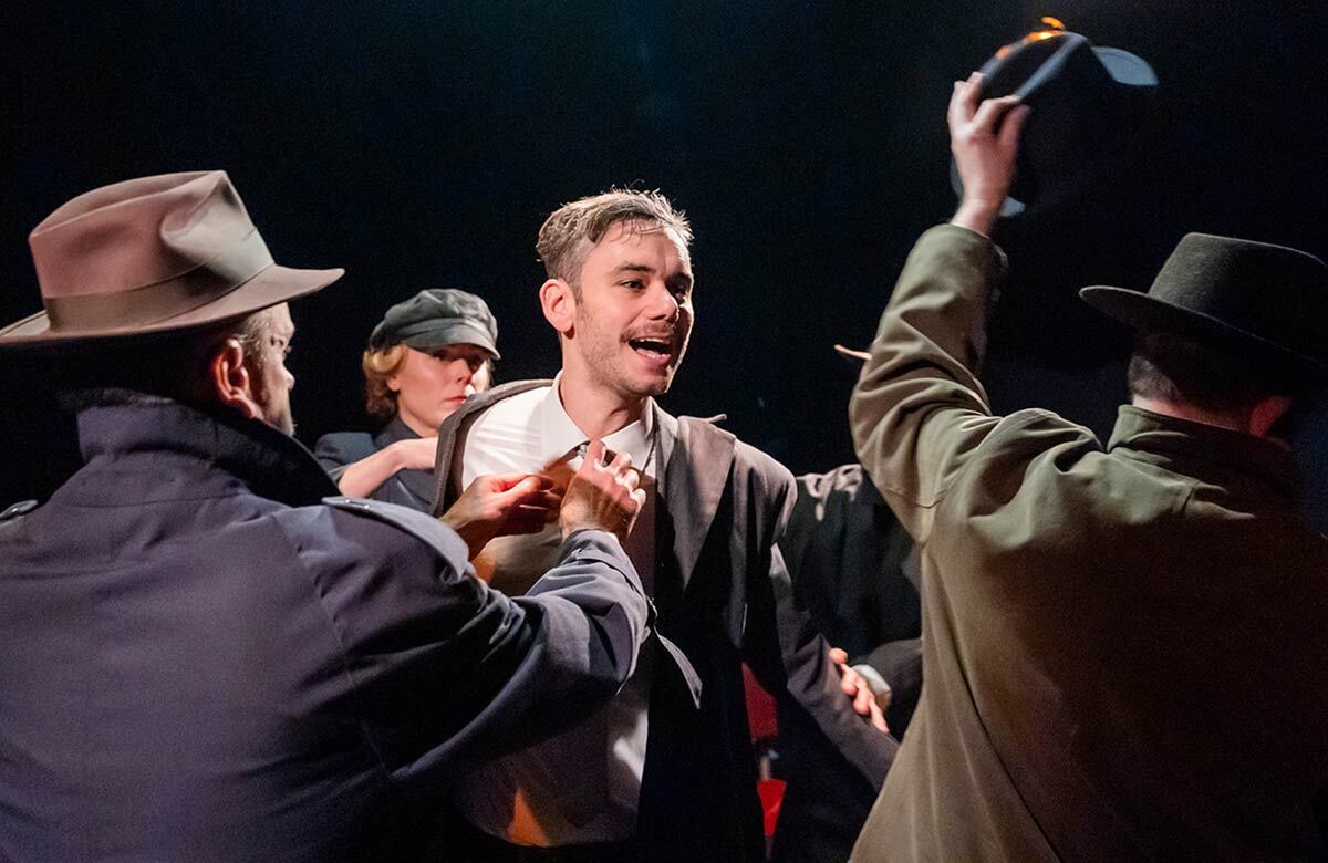 Robert Neumark Jones, centre, in The Passenger at the Finborough Theatre, London. Photo: Tristram Kenton