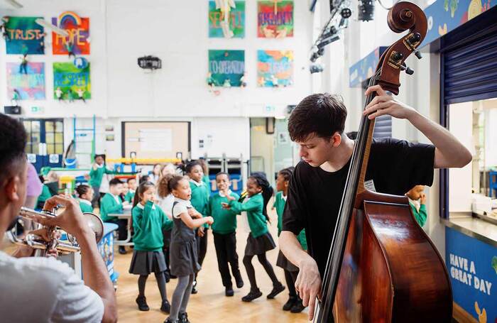 Trinity Laban students performing for schoolchildren. Photo: Alex Brenner