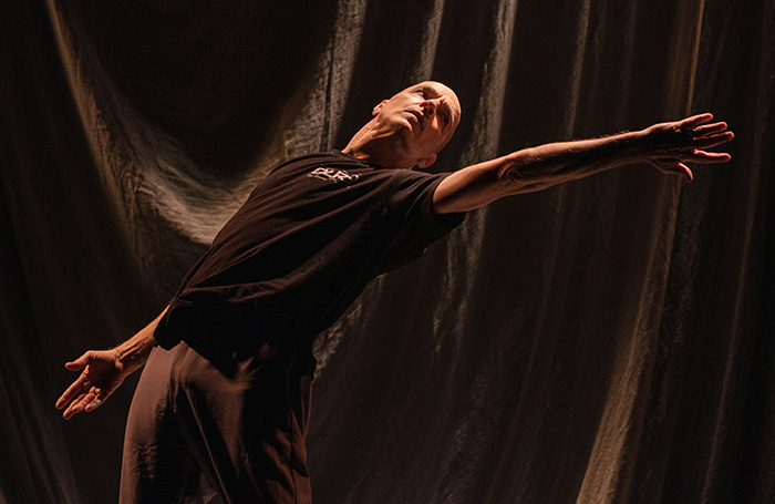 Russell Maliphant performing In a Landscape at the Coronet Theatre, London. Photo: Dmitri Djuric