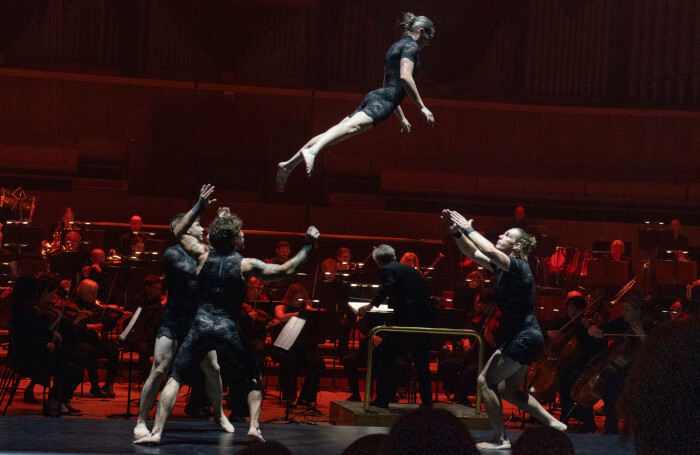 The cast of Circa and London Philharmonic Orchestra – Daphnis and Chloé at Royal Festival Hall, London. Photo: Pete Woodhead The cast of Circa and London Philharmonic Orchestra – Daphnis and Chloé at Royal Festival Hall, London. Photo: Pete Woodhead
