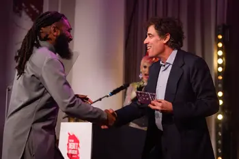 Daniel Bailey, best creative debut winner at The Stage Debut Awards 2024, with Stephen Mangan