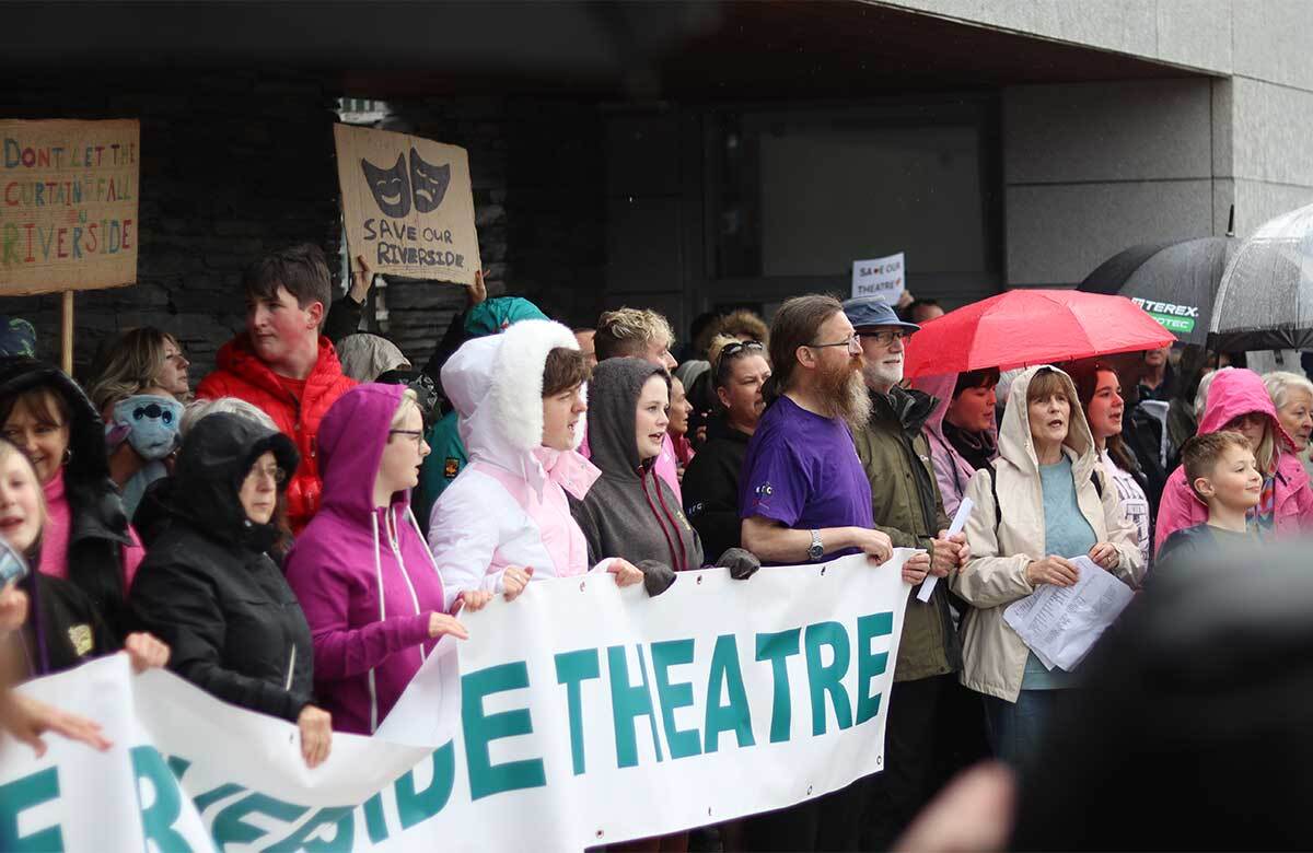 People gathered outside the offices of Causeway Coast and Glens Council to protest the forecast closure of Northern Ireland's Riverside Theatre. Photo: Steven Millar
