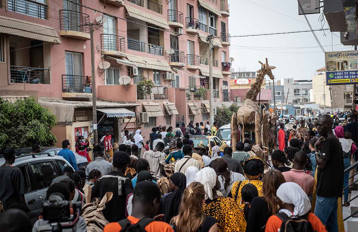 A puppet from The Herds project makes its way through the streets of Dakar, Senegal. Photo: Jean Baptise Joire A puppet from The Herds project makes its way through the streets of Dakar, Senegal. Photo: Jean Baptise Joire