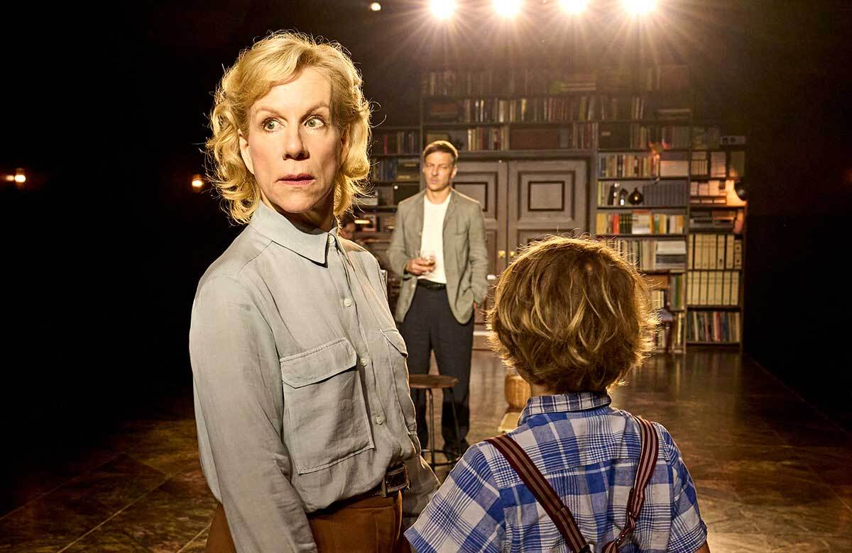 Juliet Stevenson, Tom Wlaschiha and Artie Wilkinson Hunt in The Land of the Living at the National Theatre, London. Photo: Manuel Harlan Juliet Stevenson, Tom Wlaschiha and Artie Wilkinson Hunt in The Land of the Living at the National Theatre, London. Photo: Manuel Harlan