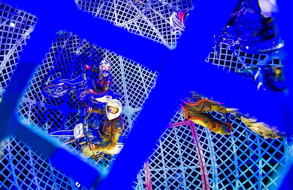 The Lucius Team perform in the Globe of Death in Cirque Berserk by Zippos at the Peacock Theatre, London (2016). Photo: Tristram Kenton