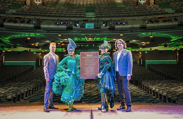 A plaque to celebrate Wicked's milestone of becoming the ninth-longest-running West End show was unveiled on the stage of the Apollo Victoria Theatre. Photo: Troy David Johnston