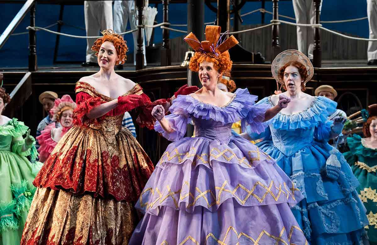 Mel Giedroyc (centre) in ENO's HMS Pinafore at the London Coliseum (2025). Photo: Tristram Kenton