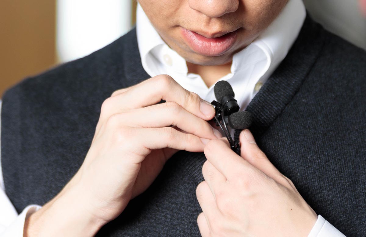 While some miss the naturalism of a non-miked performance, microphones provide support for hearing-impaired audience members. Photo: Shutterstock