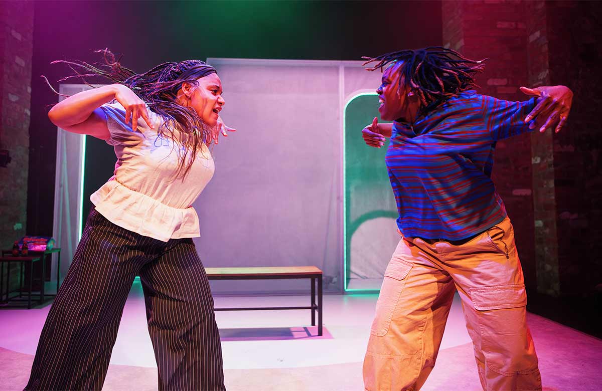 Naomi Denny and Michaella Moore in All the Happy Things at Bristol Old Vic (2026). Photo: Alex Brenner Naomi Denny and Michaella Moore in All the Happy Things at Bristol Old Vic (2026). Photo: Alex Brenner
