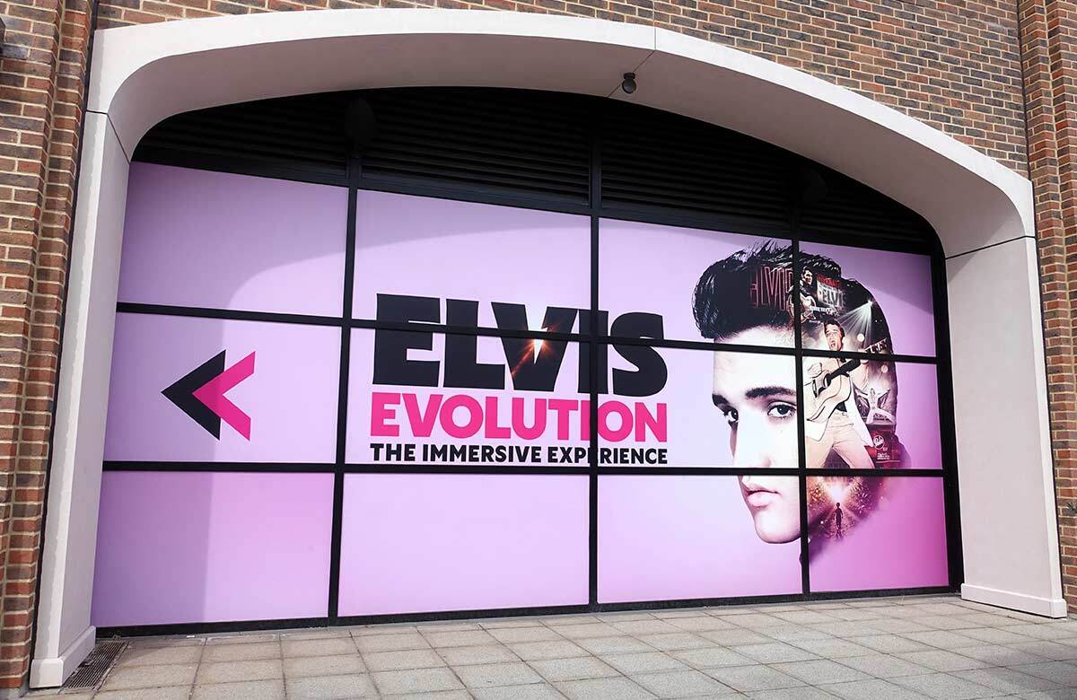 An advertisement for Layered Reality&rsquo;s Elvis Evolution at Royal Victoria Dock, London. Photo: Shutterstock