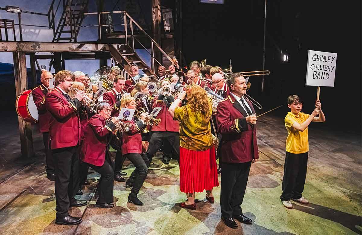The company of Brassed Off at Leeds Playhouse. Photo: Kirsten McTernan The company of Brassed Off at Leeds Playhouse. Photo: Kirsten McTernan